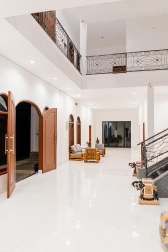 Общ салон/телевизионна зона, De Luna Guest House in Labulia