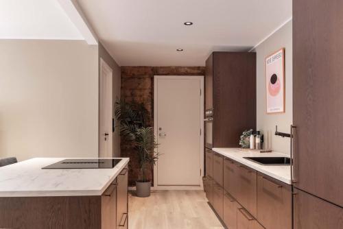 DINBNB Apartments l 50 meters to Bryggen l New 2023 l Sunny backyard DINBNB Apartments l 50 meters to Bryggen l New 2023 l Sunny backyard