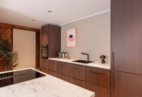 DINBNB Apartments l 50 meters to Bryggen l New 2023 l Sunny backyard DINBNB Apartments l 50 meters to Bryggen l New 2023 l Sunny backyard