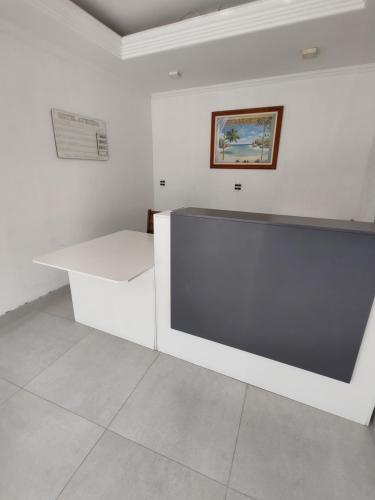 ทางเข้า, Hotel Avenida ao lado do shopping in กวาราตินกิวต้า