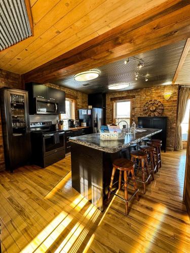 THE LOFT 3 level urban cabin with a HUGE patio! in Willmar