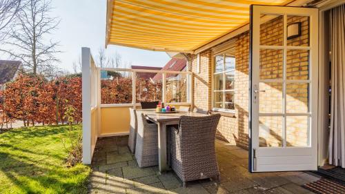 ระเบียง/ชานเรือน, Klavertje vier in อาคท์ดอร์พ