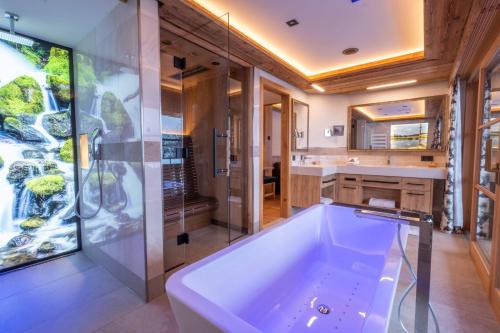 浴室, Natur- & Wellnesshotel Brunner Hof in 阿恩施旺