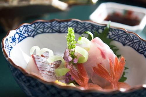 Western-style room with a seasonal Kaiseki dinner and Japanese breakfast