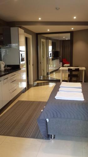 BMK Suites Apartments - Tap to explore photos
