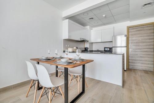 Modern 1BR with Balcony, Pool & Stunning City Views, Дубай
