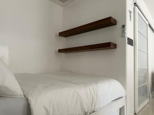 Modern Japanese Resort-Type Condo - Tap to explore photos