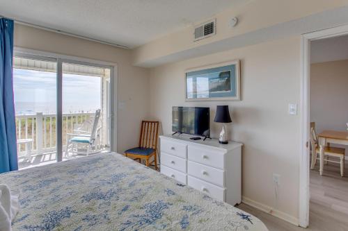 Windy Hill Beachfront Condo with Private Patio! - image 11