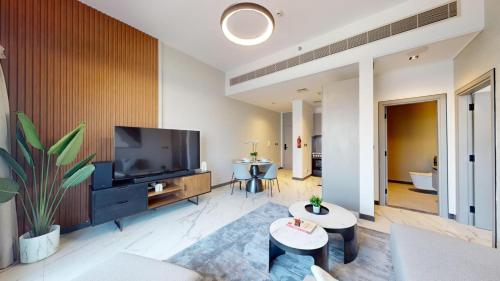 Vacationer Holiday Homes I Airy 1 Bedroom l Modern Finishes l Wi-Fi & Equipped Kitchen l Meydan, Dubái (foto 6)