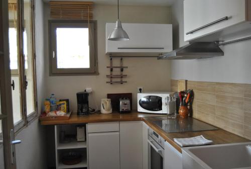 ห้องครัว, Cottage Les Quatre Saisons in ฌีแวร์นี