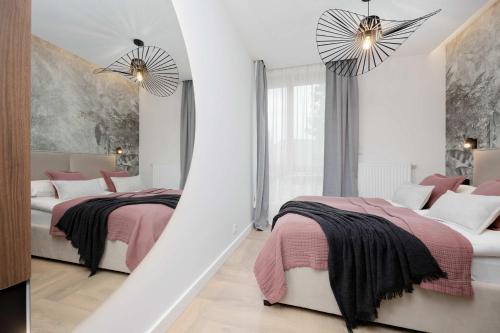 Apartment Sarmacka Wilanów with Parking Sauna & Gym by Noclegi Renters - image 2