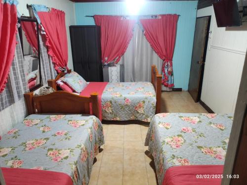 Quadruple Room room in Posada Nativa Miss Trinie