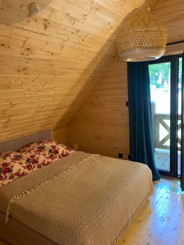 Dadaj Chill Wilimy domek sauna, balia jakuzzi, fotel masujący, plaża (Dadaj Chill Wilimy domek sauna, balia jakuzzi, fotel masujacy, plaza) in Віліми