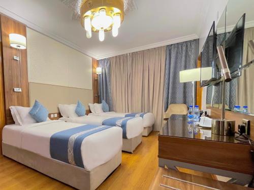Chambre triple, 3 lits