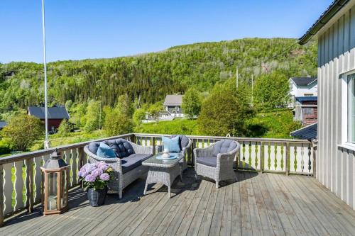 Serene Countryside Holiday Home with Fjord Views and blooming Gardens in Tverlandet