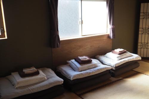 Japanese-Style Quadruple Room room in Guesthouse Azito