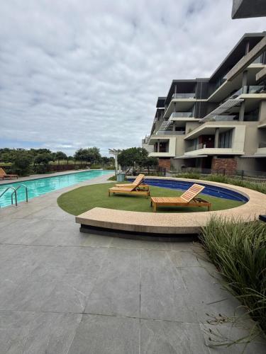 Swimming pool, Sibaya's Cozy Apartment in Oceans Dune in Umdloti