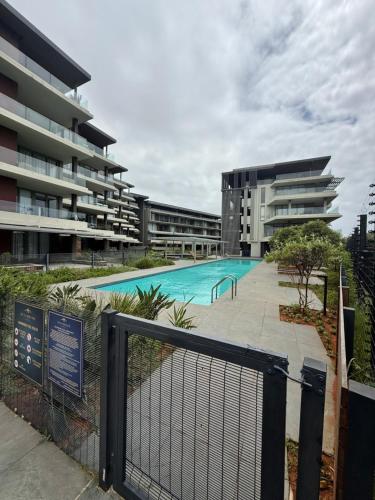 Swimming pool, Sibaya's Cozy Apartment in Oceans Dune in Umdloti