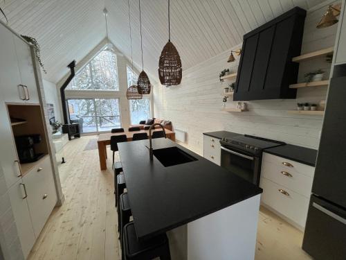 virtuve, Chalet Les 3 Versants Mont-Edouard 38A in Lensendžīna (QC)