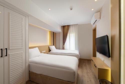 Elegance Grand City Hotel - image 11
