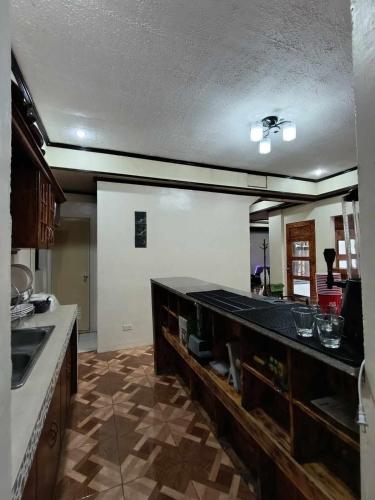 Kitchen, Spacious 3-Floor  6-BR Home, Pool, BBQ, KTV, WIFI near Davao Butterfly House