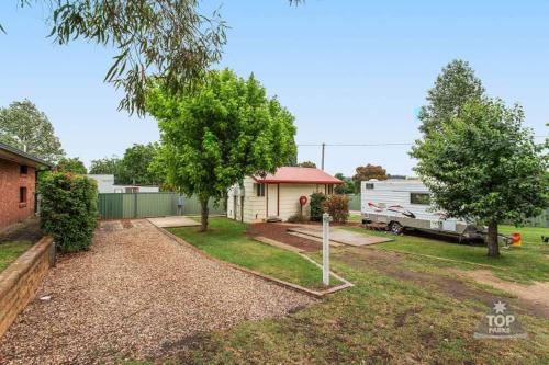 Fossicker Caravan Park Room Type - Standard Powered Site with Shared Bathroom (Bring your own Caravan/Tent)