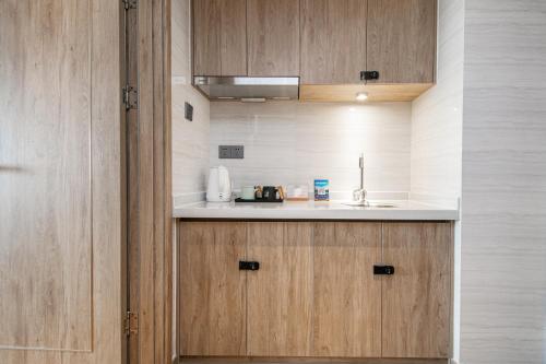 ห้องครัว, Zhujiajian Chunyu Qiushe Apartment in จูเจียเจียน