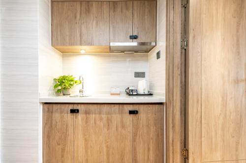 ห้องครัว, Zhujiajian Chunyu Qiushe Apartment in จูเจียเจียน