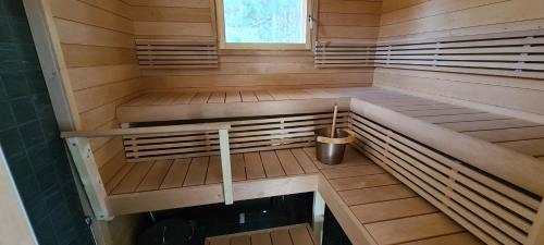 Sauna, Villa Vahonranta beach house in Parkano