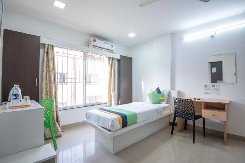 Deluxe Room With Coffee Table room in Treebo Empire Executive Hinjewadi