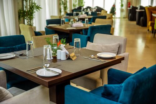 레스토랑, Lakowe Lakes Hotel Golf and Country Estate by NEWMARK in 레키