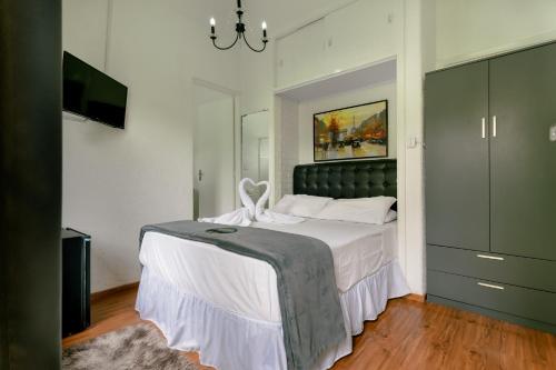 Deluxe Suite room in Pousada Casa de Campos Capivari House by Concavus