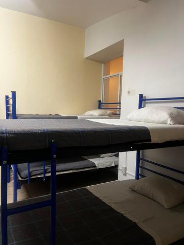 Hostal Amigo - Hostel Room Type - 1 Person in 4-Bed Dormitory with Shared Bathroom - Mixed