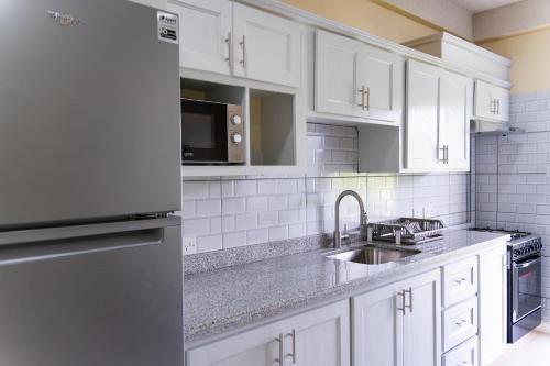 Kitchen, Xenias Universal Apartments Inc in Calliste