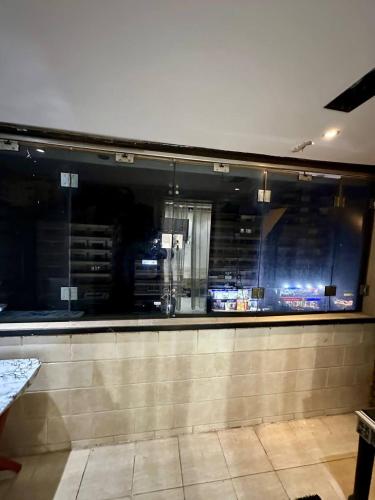 A private room exclusively for men, offering comfort and convenience for a relaxing stay in Kairo