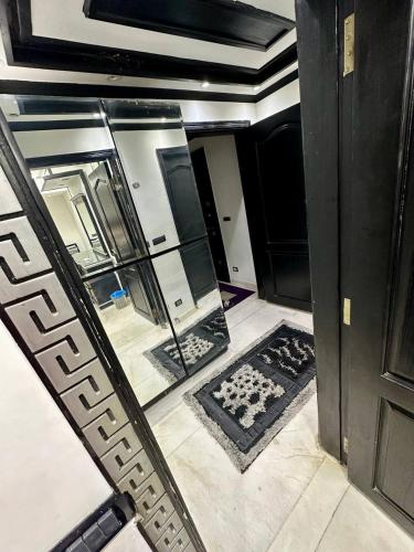 A private room exclusively for men, offering comfort and convenience for a relaxing stay in Kairo