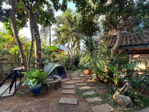 Kert, The Snug Airportel in Phuket