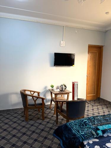 Shared lounge/TV area, The Aastana near Sheikh ul-Alam International Airport