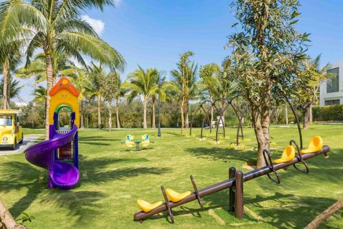 Garden, Hoi An Wyndham Beachfront Resort 3 bedroom pool villa in Dien Duong