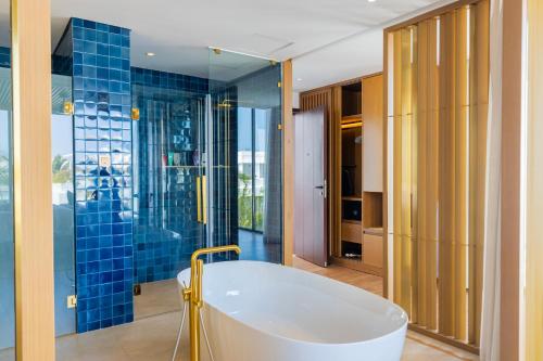 Bathroom, Hoi An Wyndham Beachfront Resort 3 bedroom pool villa in Dien Duong