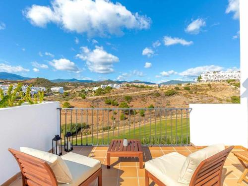 Villa con piscina climatizada y vistas al Golf in ลาส โคยาส