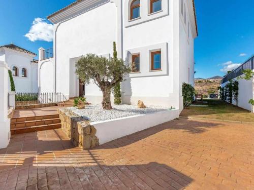 Villa con piscina climatizada y vistas al Golf in ลาส โคยาส