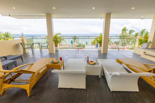 阿米罕海濱旅館 (Anahaw Seaside Inn) in 班塔延島