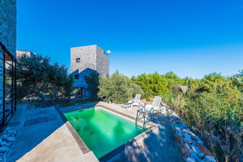 Swimming pool, Luxury Holiday Home Itana with Private Pool and Sea View in Dragove