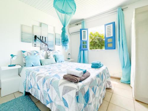 Grande villa climatisée,jardin, ideale famille, groupe amis, proche port de peche,littoral (Grande villa climatisee,jardin, ideale famille, groupe amis, proche port de peche,littoral) in เลอ ยามัน