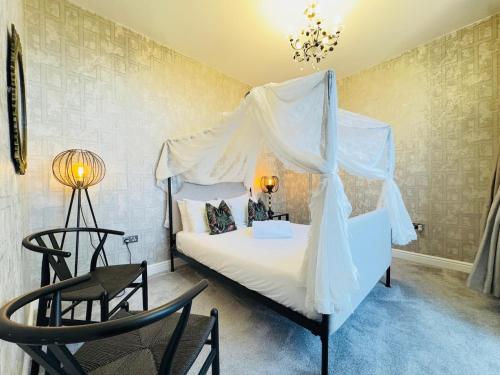 Top Floor Getaway with Cozy Canopy Bed
