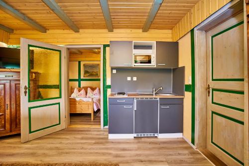 virtuve, Hotel Olbernhau mit Sauna - Kleines Landhotel zur Ofenschenke in Pfaffroda