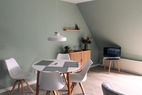 Hus op de Wurth Ferienwohnung seaside sixteen in Büsumer Deichhausen, Deutschland