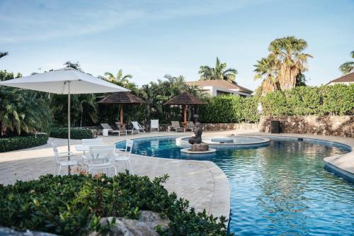 2BR LXRY Jansofat tropic oasis apt & pool in 紐波特