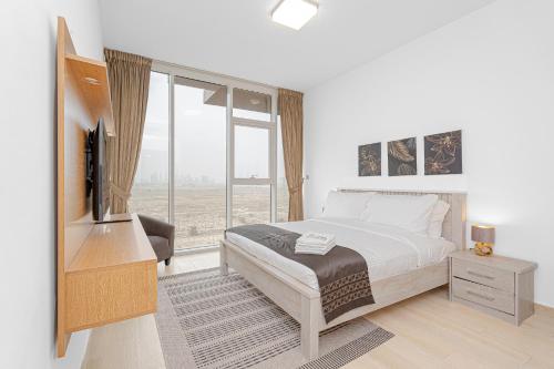Escape24 Cozy Studio with City View in JVC, Dubaj
